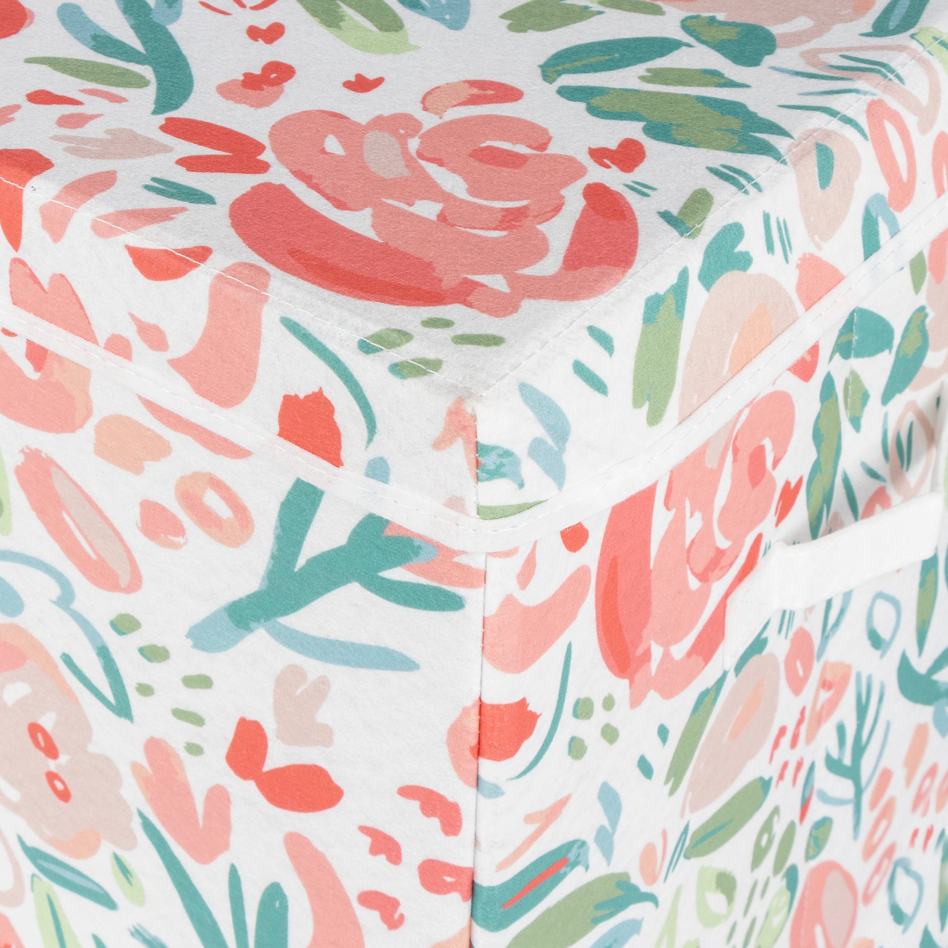 Close up shot of Painterly Floral Felt Toy Box by Sammy & Lou® showing the color floral pattern