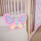 Floral Butterfly 4 Piece Crib Bedding Set by Sammy & Lou®; stylized image of butterfly plush toy