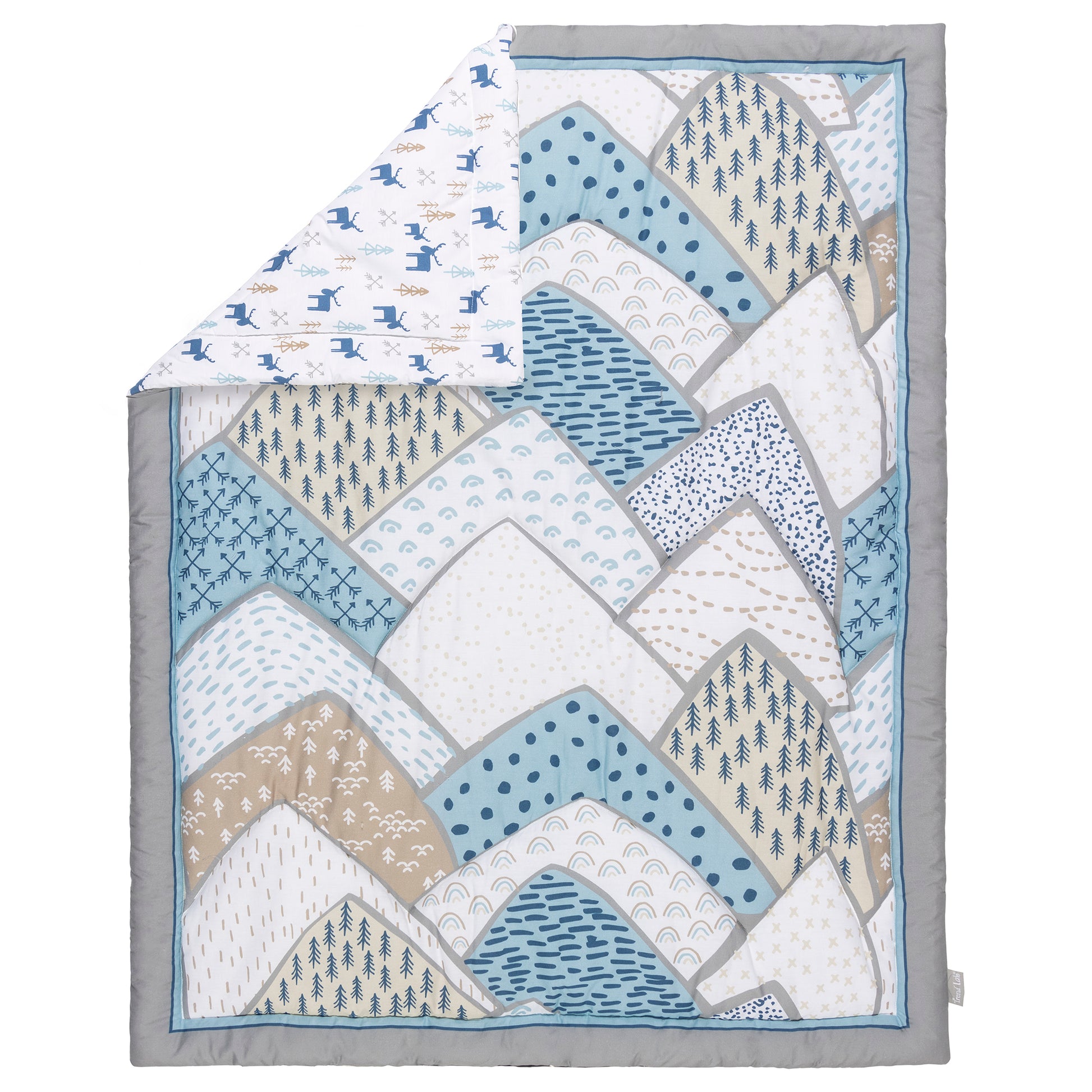 Big Sky 4 Piece Crib Bedding Set- folded corner showcasing reverse side quilt pattern