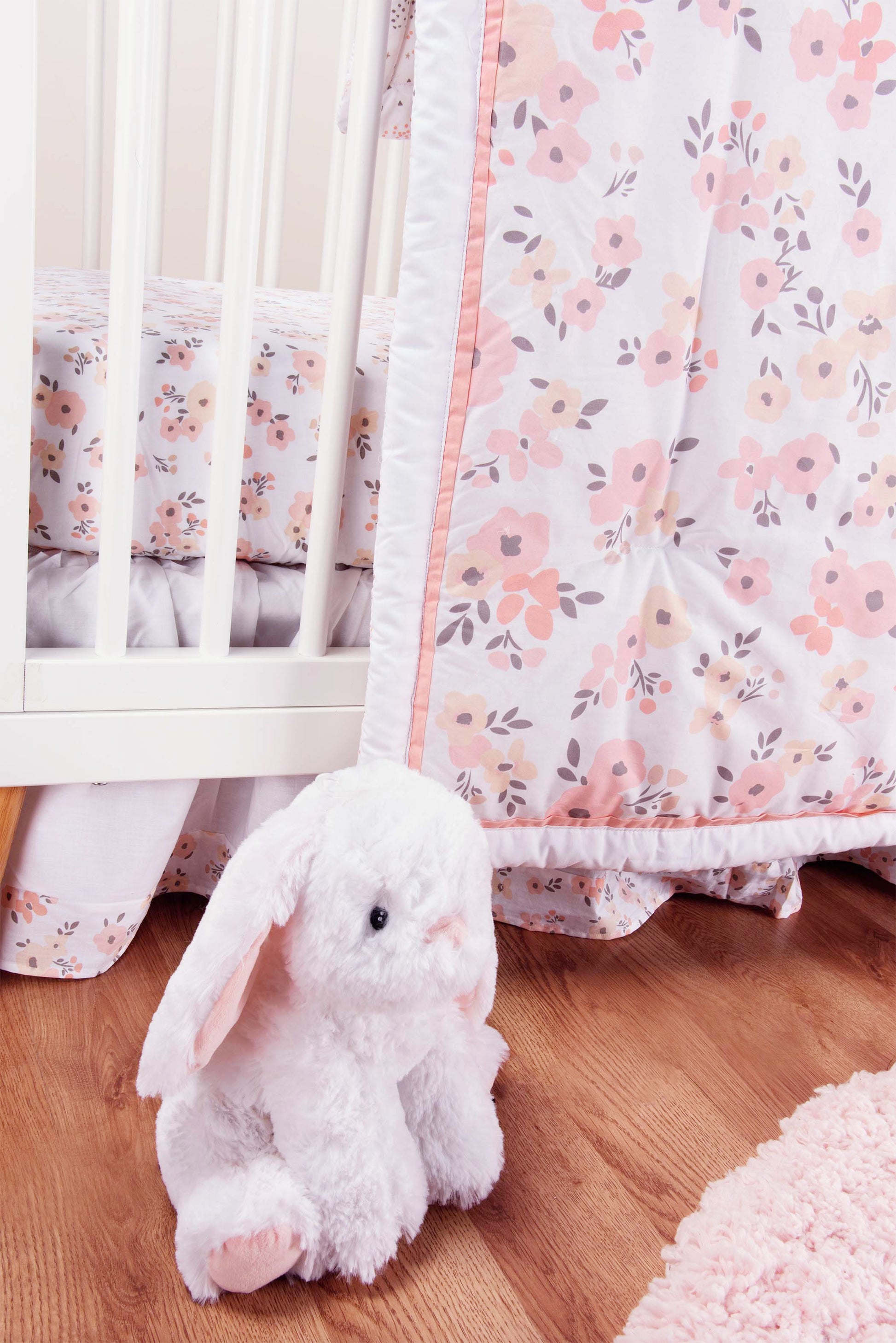Stylized in Room Blush Floral 3 Piece Crib Bedding Set - features coordinating plush