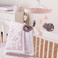 Stylized in Room Blush Floral 3 Piece Crib Bedding Set - features coordinating musical crib mobile