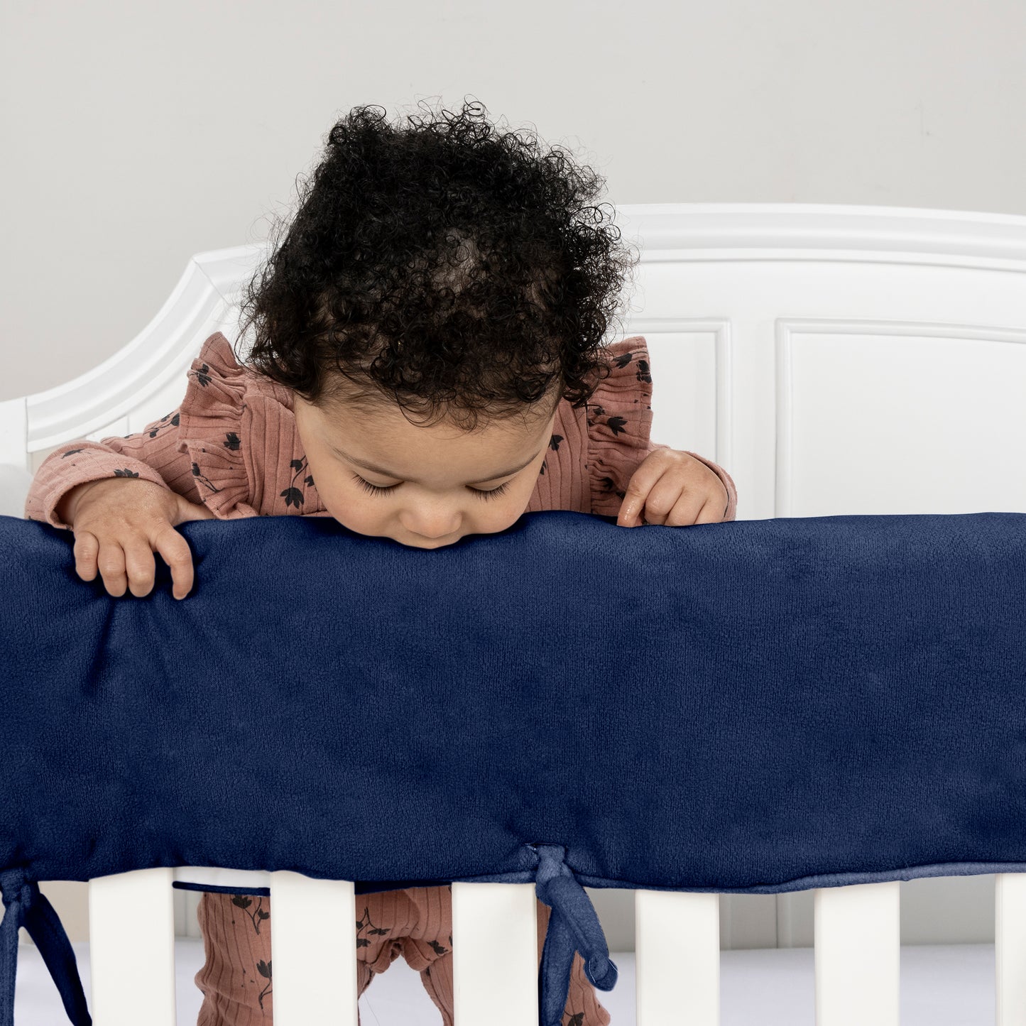 CribWrap® Wide 2 Short Navy Fleece Rail Covers; the perfect solution for protecting your crib and teething baby. With super soft navy sherpa fleece on the top, a light padding in the middle and waterproof backing, you no longer have to worry about your b