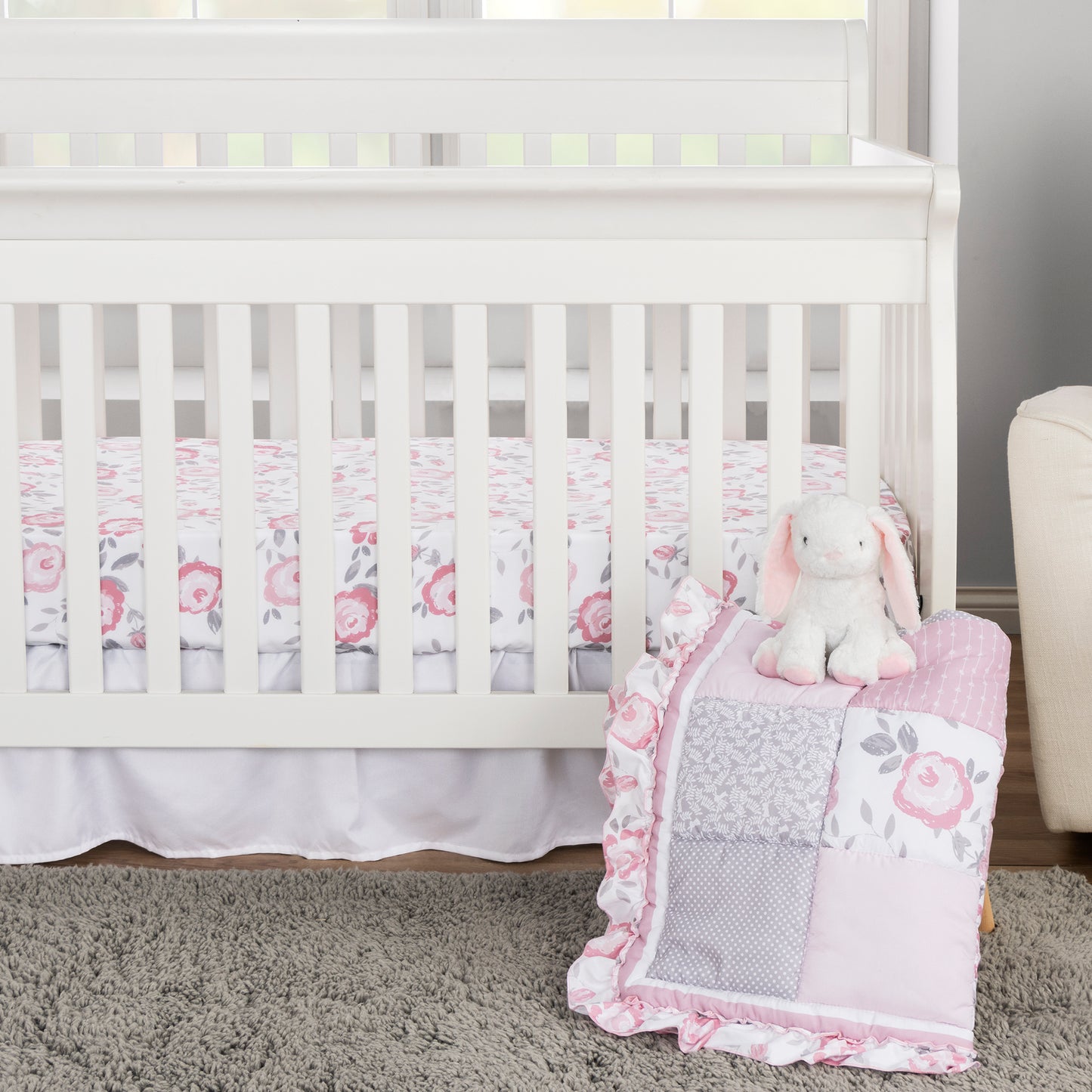 Emma 4 Piece Crib Bedding Collection by Sammy and Lou; stylized bedding in nursery