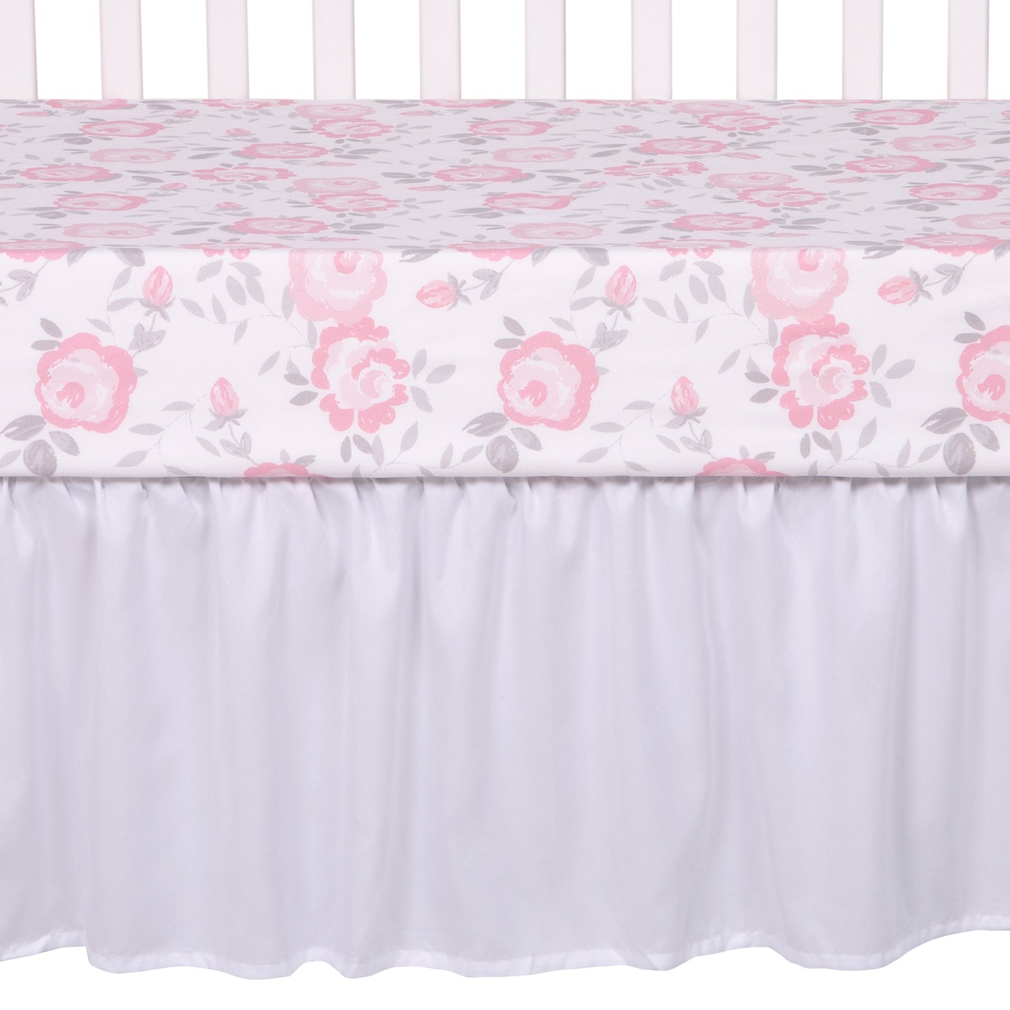  Emma 4 Piece Crib Bedding Collection by Sammy and Lou; crib sheet and crib skirt. Crib skirt t fits standard crib mattress 28 in x 52 in with 14-inch drop and is a solid pink with ruffled detailing.