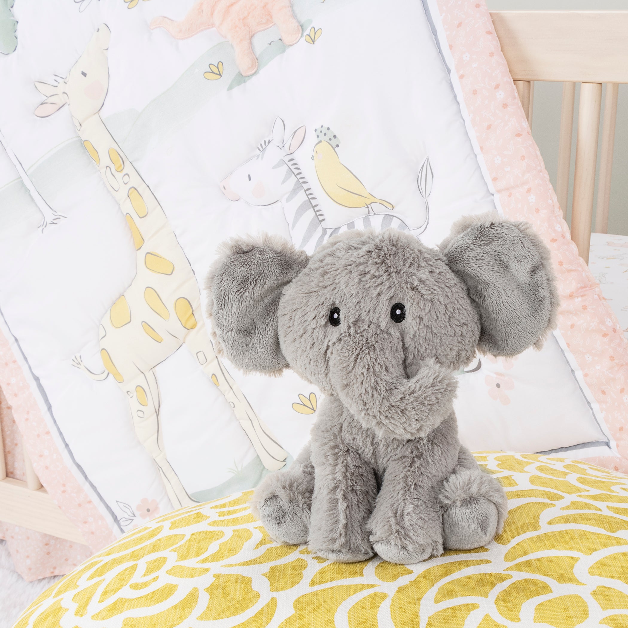 Giraffe and elephant store crib bedding