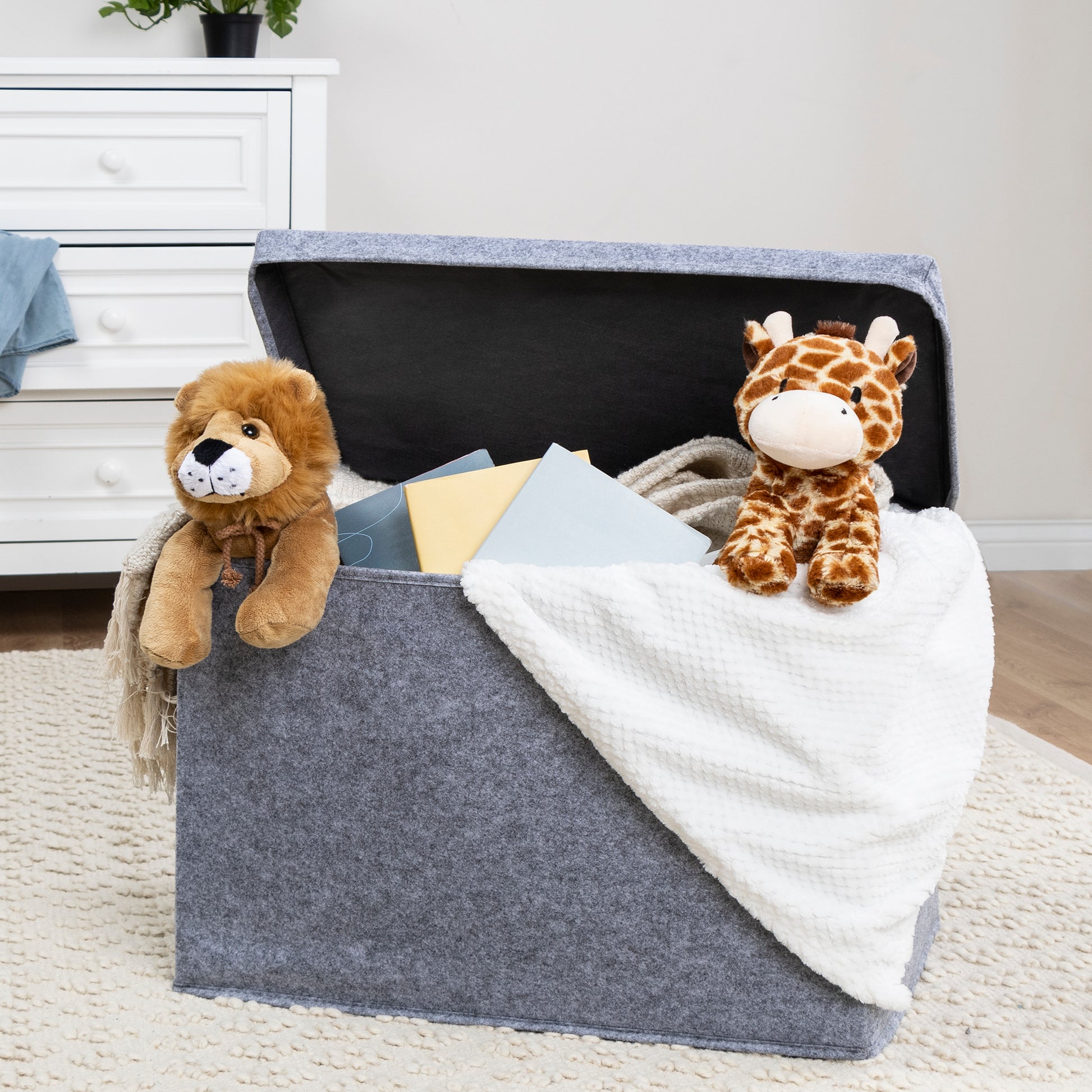Gray Felt Toy Box by Sammy & Lou® with lid open with toys and stuffed animals peeking out