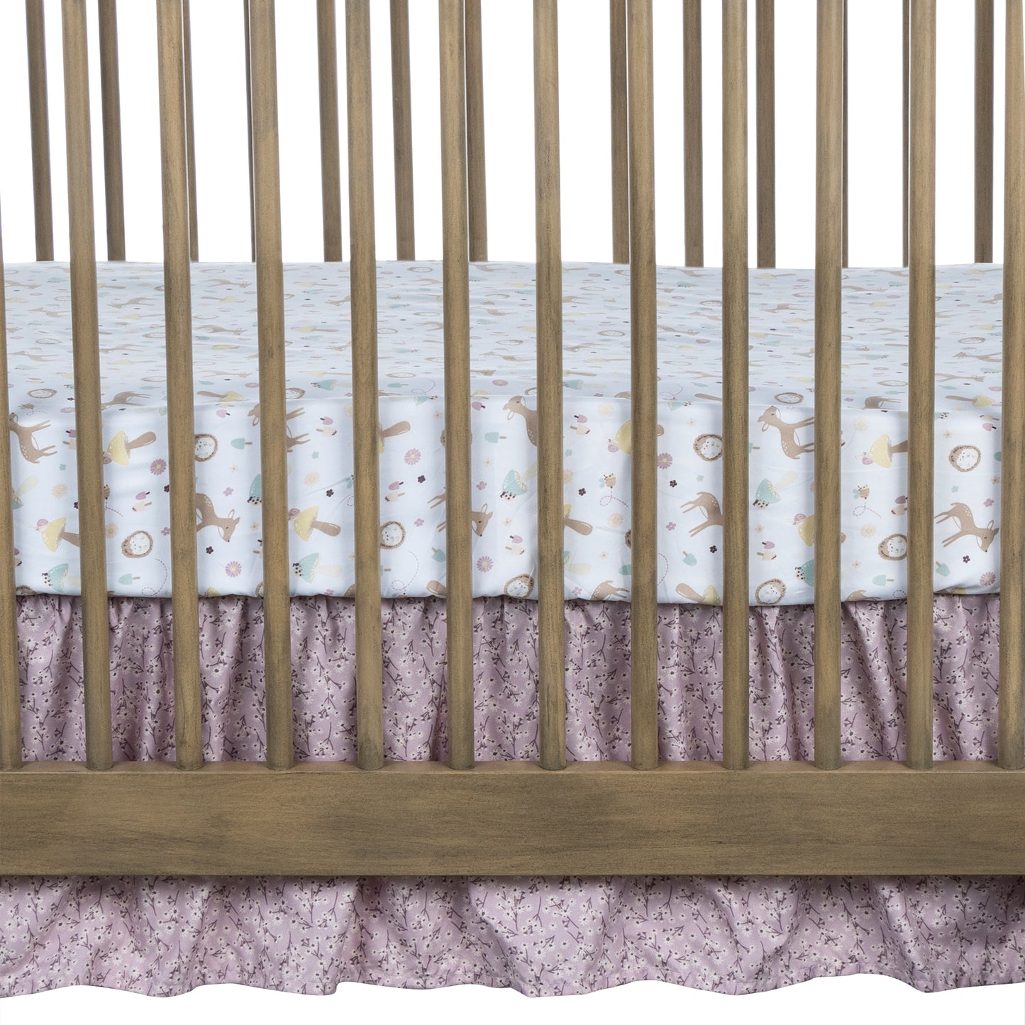 Enchanted Garden 4 Piece Crib Bedding Set by Sammy & Lou®; crib skirt features a lilac floral scatter print.