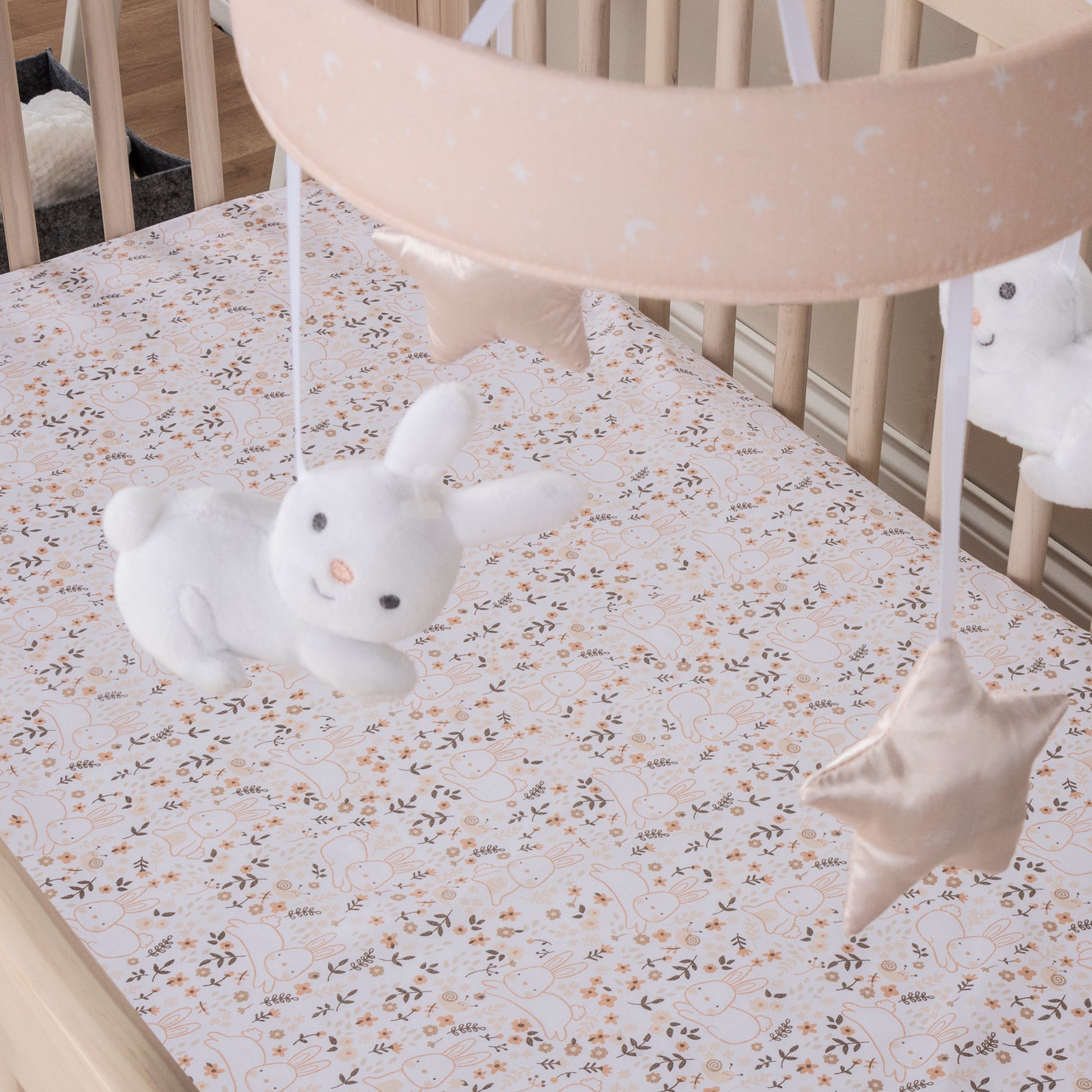  Stylized image of cottage floral crib sheet with coordinating bunny mobile by sammy and lou sold separately