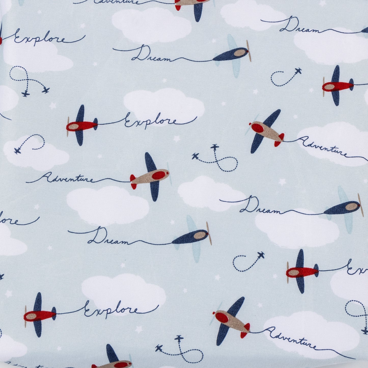 Air Travel 3 Piece Crib Bedding Set by Sammy & Lou® - swatch view of crib sheet with blue background, red and navy airplane scatter print and clouds