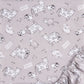Crib Sheet overhead view- pattern features a scattered farm animal print featuring a mama cow, baby cow, with their pig and sheep friends wandering through a farm field in a neutral palette of glacier gray, bedtime gray and white.