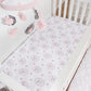 Elephant Garden 4 Piece Crib Bedding Set by Sammy & Lou®- stylized crib sheet on white crib. Crib sheet features a scatter print with sweet glacier gray baby elephants surrounded by a floral frame in coral blush, poppy pink, salmon, light green, sea glass