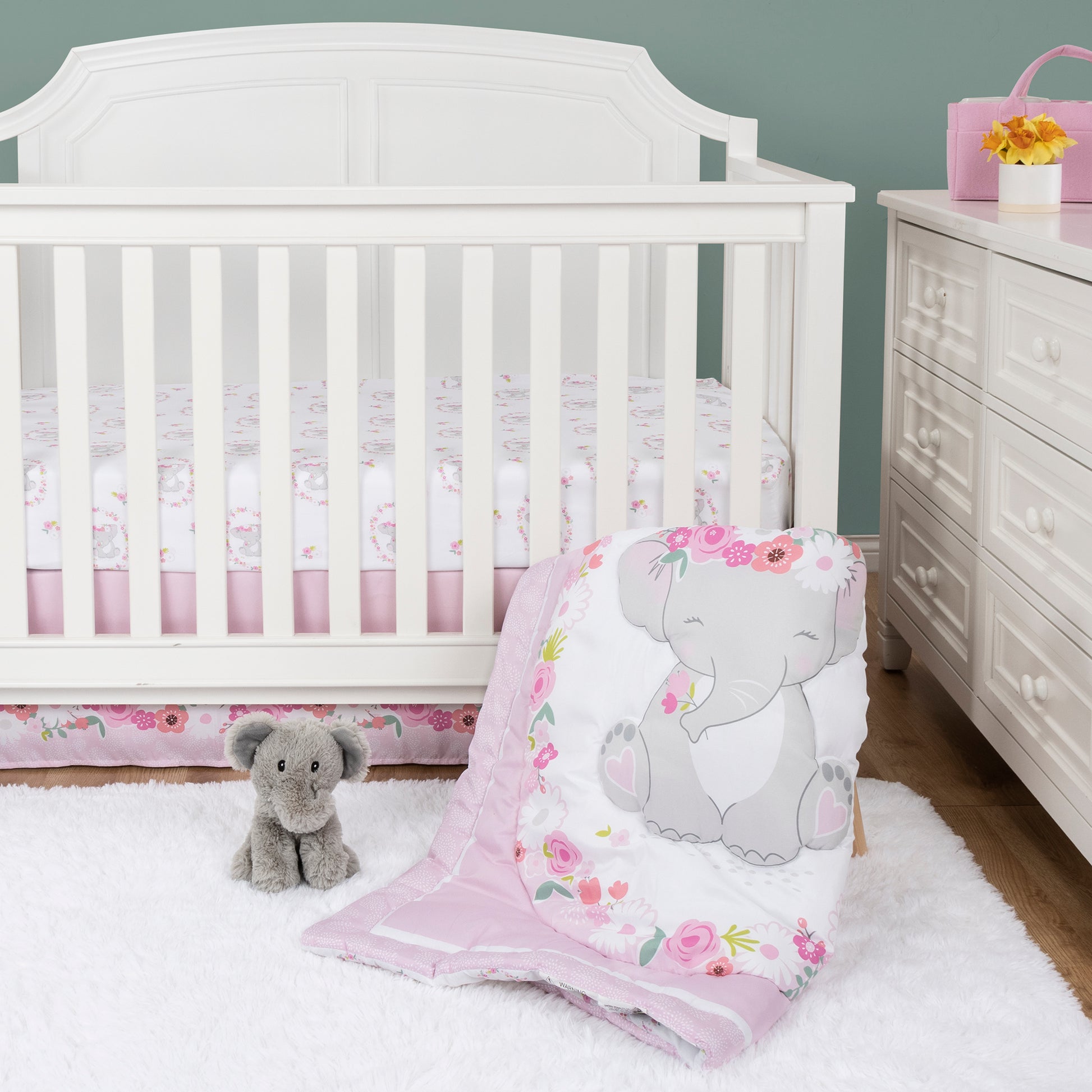  Elephant Garden 4 Piece Crib Bedding Set by Sammy & Lou® in stylized nursery. Set includes nursery quilt, fitted crib sheet, crib skirt and elephant plush toy