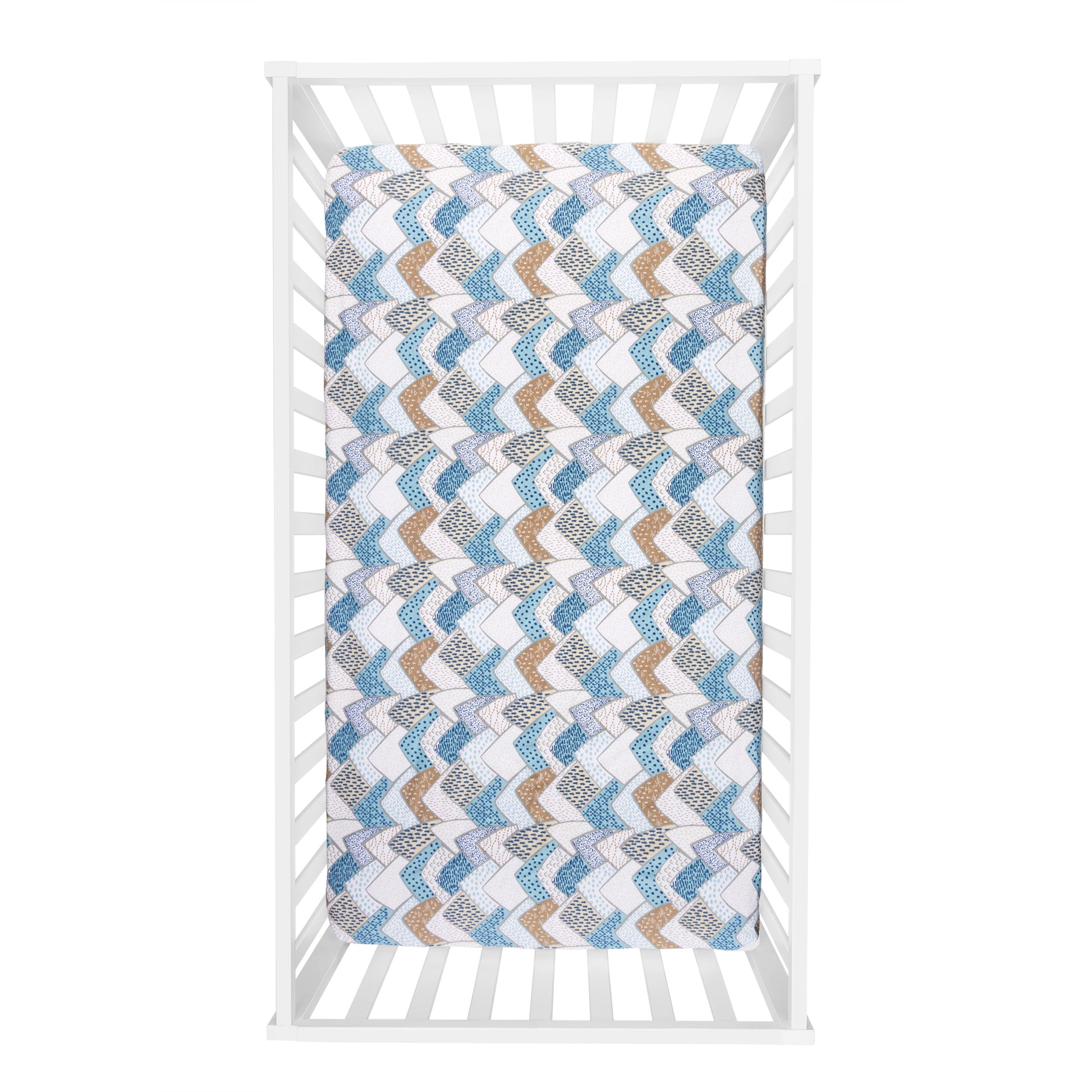 Big Sky 4 Piece Crib Bedding Set- Overhead view of crib sheet that features a multi-pattern mountain print.