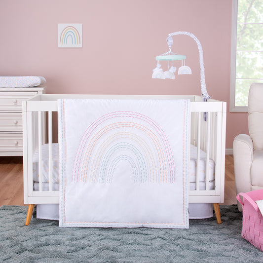 Rainbow 3 Piece Bedding Set by Trend Lab. This perfectly pastel bedding collection is the final touch to any little girl’s nursery. Includes a darling pastel rainbow palette and a stitched rainbow pattern.
