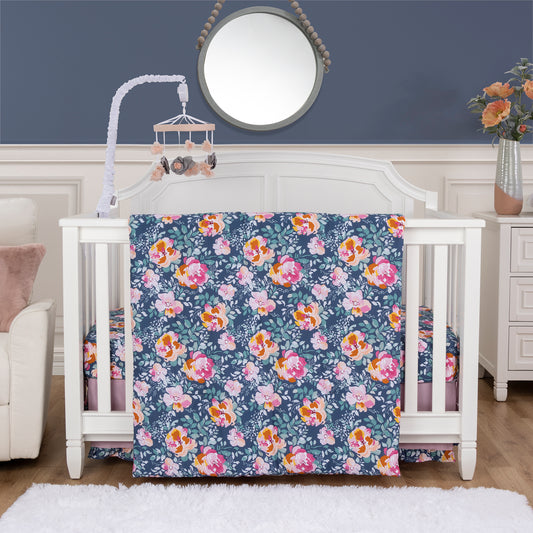 Madison 3 Piece Crib Bedding Set eatures blooming flowers and leaves in a bold palette of pink, yellow, orange, and blue making it perfect to drift off in blooming comfort in stylized room. 