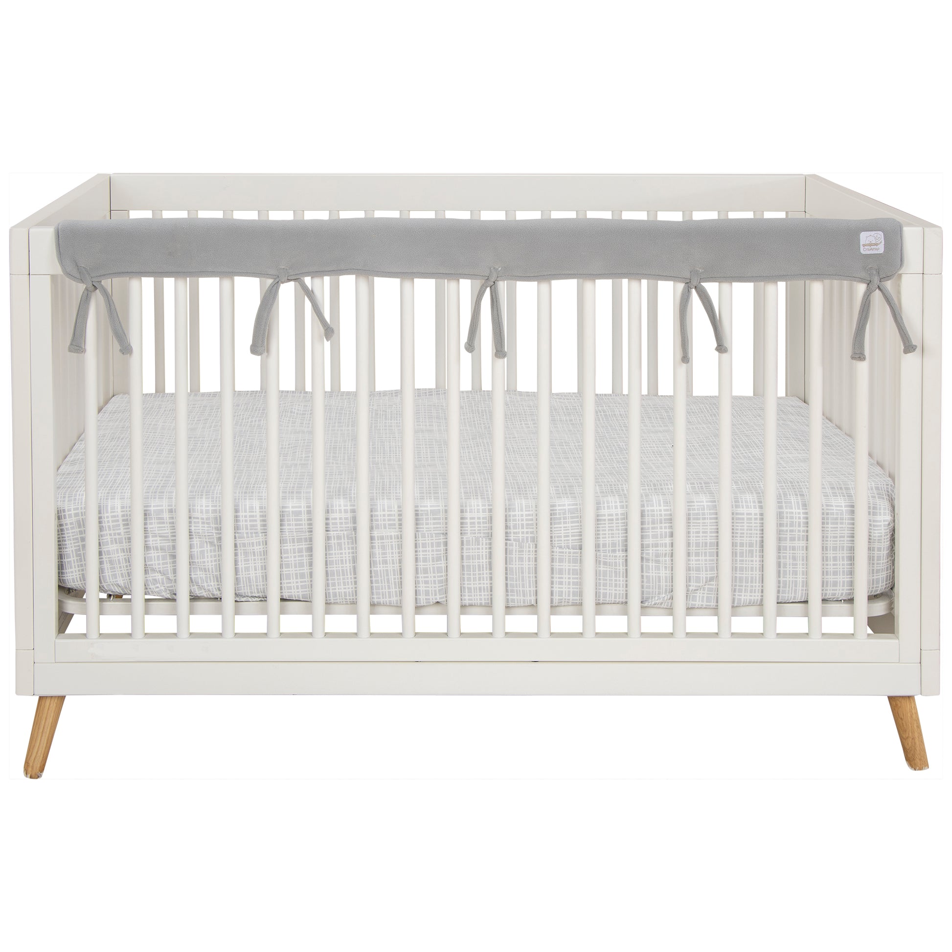 CribWrap® Narrow 1 Long Gray Fleece Rail Cover on a white crib