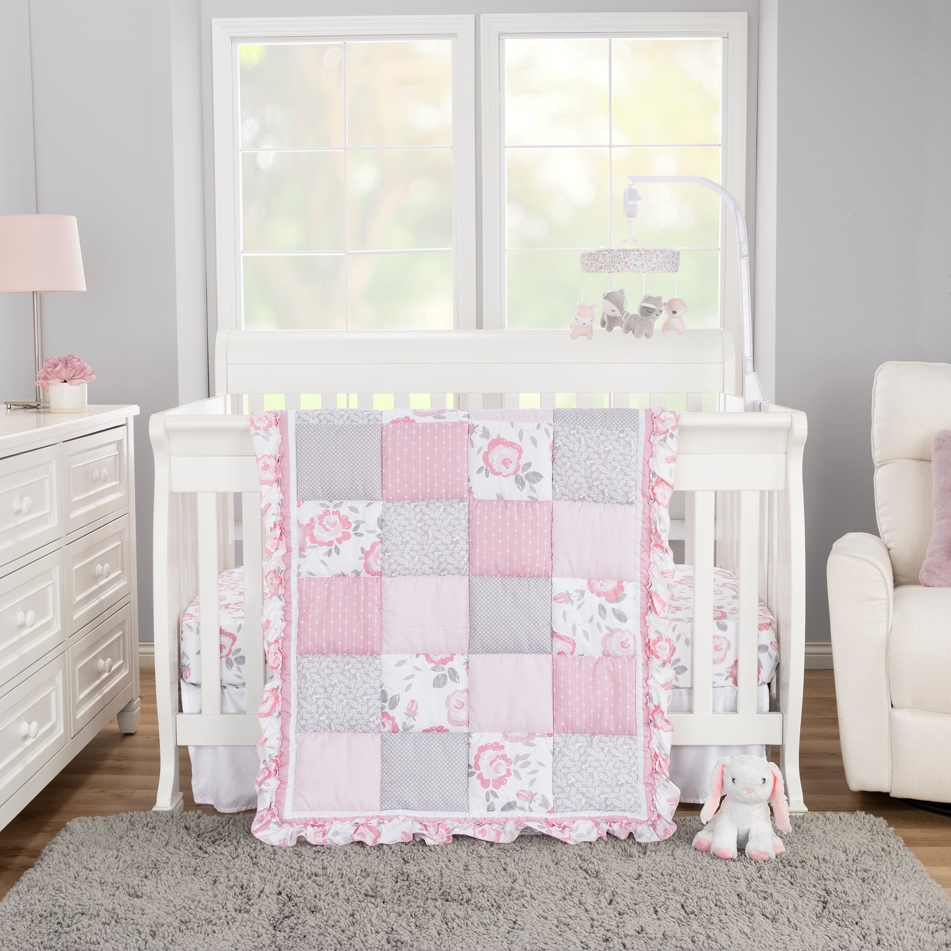Emma 4 Piece Crib Bedding Collection by Sammy and Lou in a stylized room main image